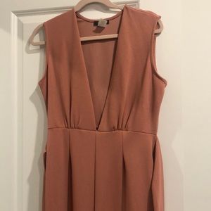 Dusty pink jumpsuit never worn before, but has no tags on it.